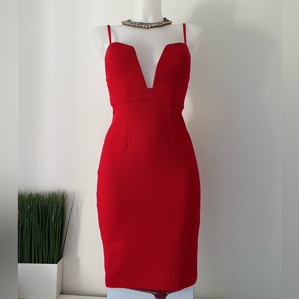 Sexy red dress, plunging neck line, perfect holiday dress